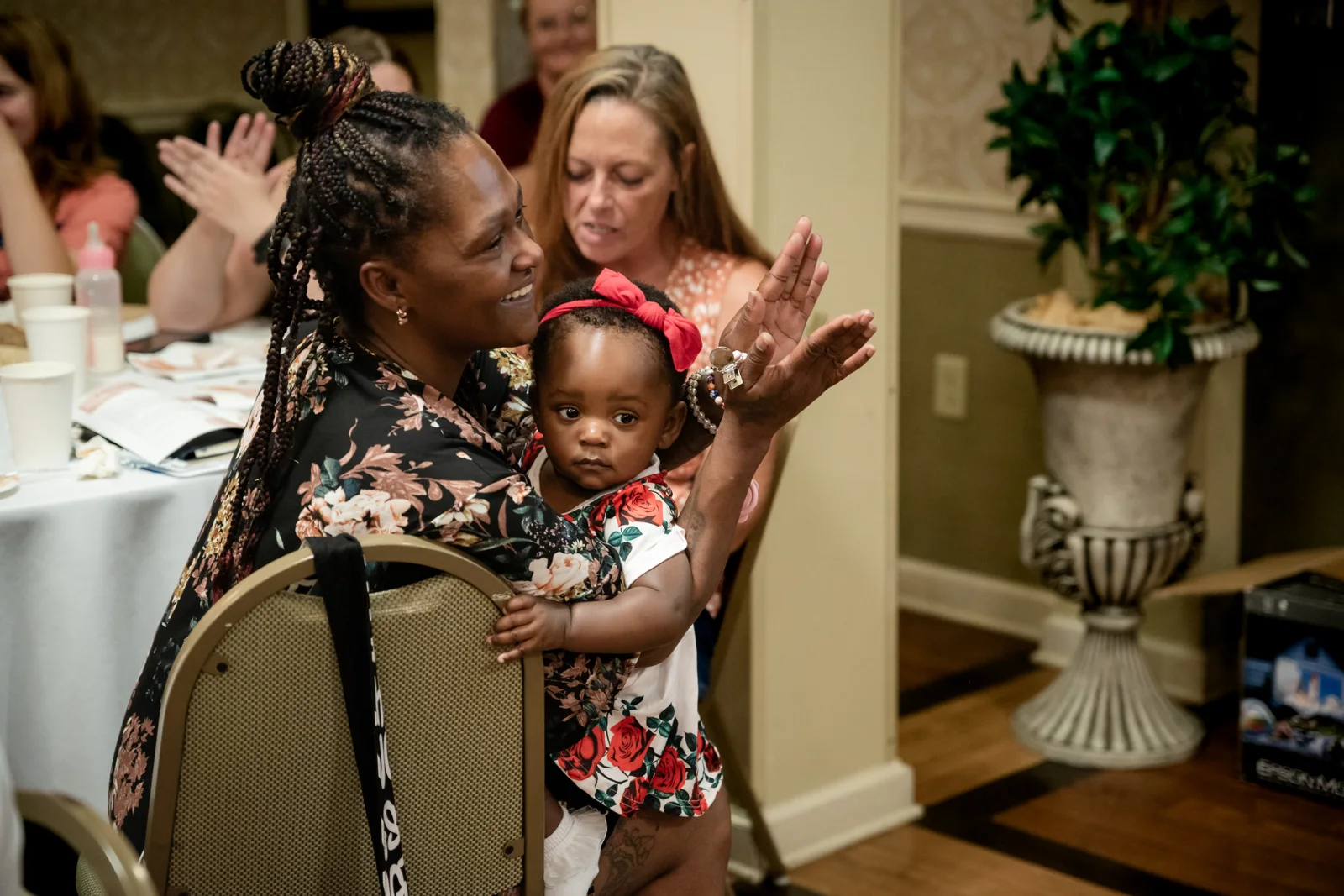 Guests applaud together during the evening