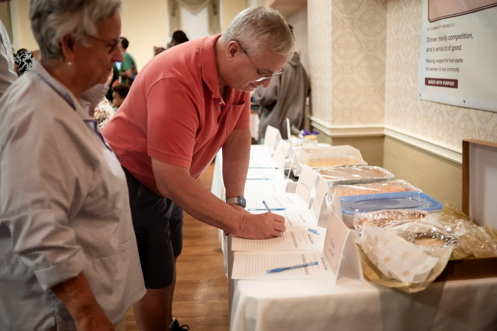 Guests look over the community baking entries