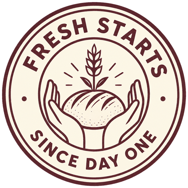 Fresh Starts Since Day One — hands holding a loaf topped with wheat